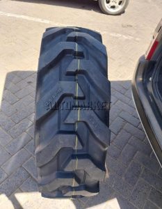 12.5/80-18 Roadhiker 12PR industrial tyre from India with durable tread for construction and industrial equipment.