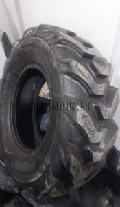 12.5/80-18 Rungold 14PR industrial tyre from China with deep tread for heavy-duty construction and industrial applications.