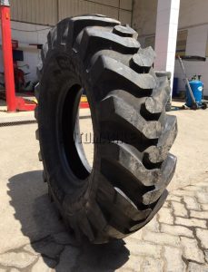 14.00-24 Apollo G2 16PR industrial tyre from India with grader traction tread for construction and earthmoving equipment.