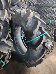 12.4-24 MRF Farm Grip 12PR agricultural tractor tyre made in India for heavy-duty farming applications.