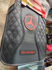Black Mercedes-Benz floor mat with red logo